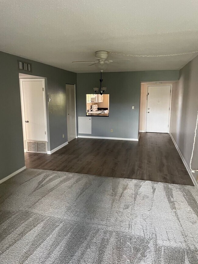 Building Photo - 55+ Charming first-floor condo nestled in ...