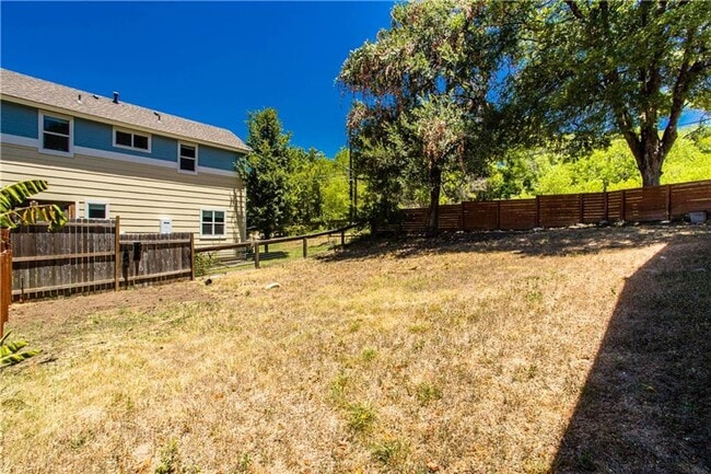 Building Photo - Stunning Renovation - New Hardwood flooring, tile in Kitchen. Granite countertops, breakfast bar