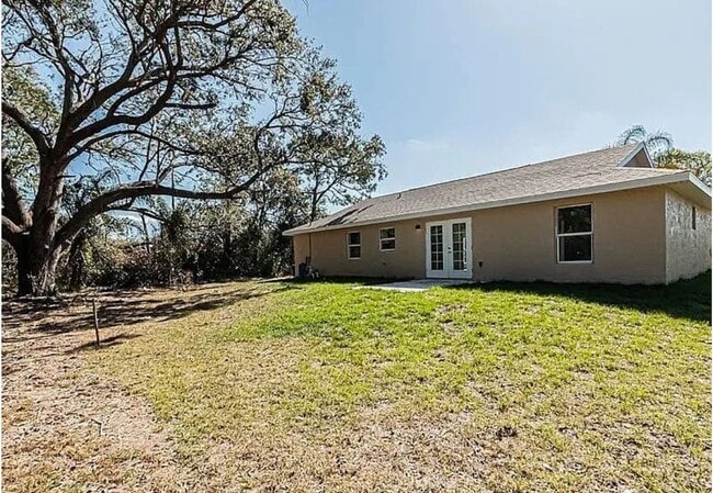 Building Photo - 3/2/1 Single Family Home Available – Cozy,...