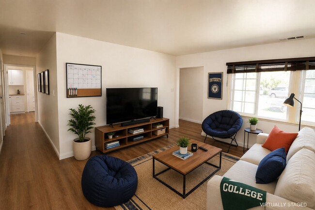 Building Photo - Spacious Student Rental Near Campus – HUGE DISCOUNT + ONE MONTH FREE!