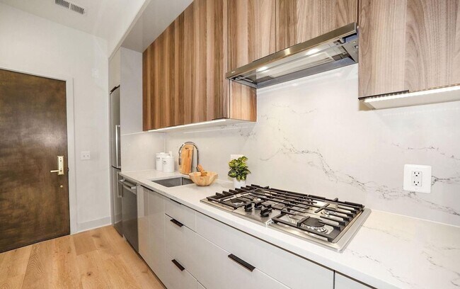 Building Photo - One Bedroom Condo in the Heart of the City + Rooftop Deck **Half Month Free on 12 Month Lease**
