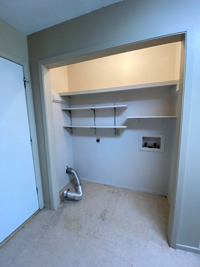 Building Photo - SPACIOUS & CUTE 2 bedroom 2 bath townhouse off Sunset Dr COMING SOON!