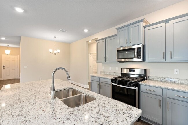 Building Photo - UPCOMING LISTING -WITH LAWNCARE- IN STONEBRIDGE