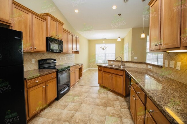 Building Photo - Stunning 4BR/3BA Home in Heritage Farms –  Ready to move-in!