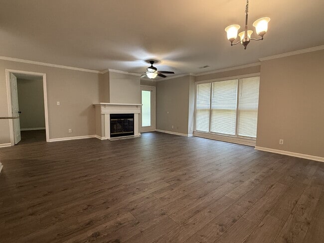 Building Photo - "Cozy 2-Bed Condo in Huntsville with Firep...