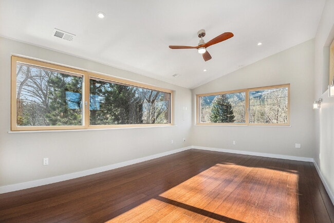 Building Photo - "Modern 4-Bed Boulder Retreat with Granite Elegance & Finished Basement!"