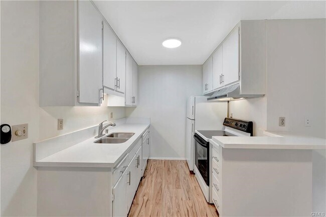 Building Photo - 564 N Bellflower Blvd