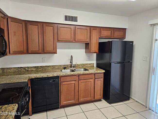 Building Photo - 1221 E Harmony Cir