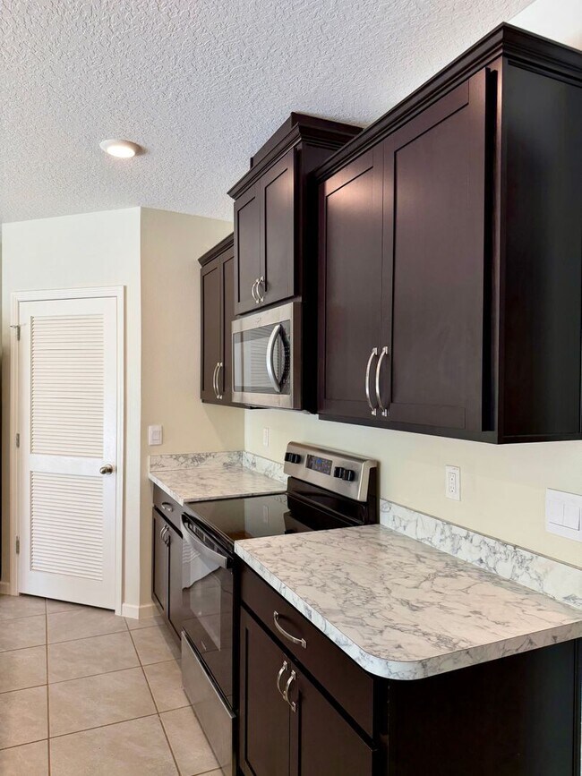 Building Photo - Palm Bay Pool Home Stunner!