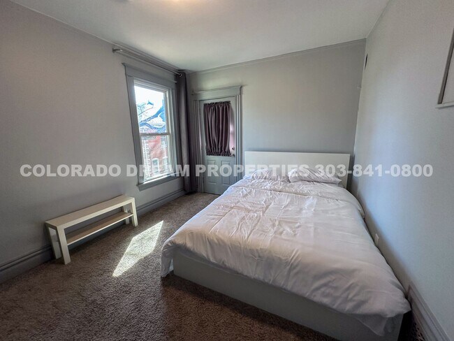 Building Photo - A home where old-world charm meets modern sophistication!