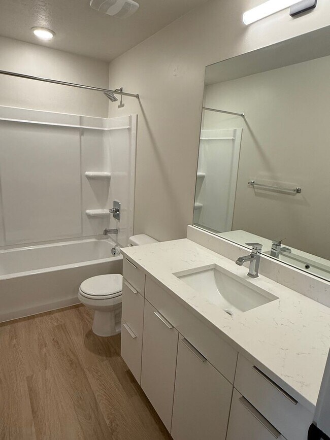 Building Photo - Half off first months rent - Beautiful townhome, construction just completed, 2 car garage, centr...