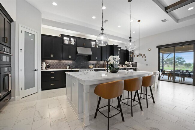 Building Photo - Luxury Home w/ Pool, Outdoor Kitchen, Car Lift, & Water View In Parrish!