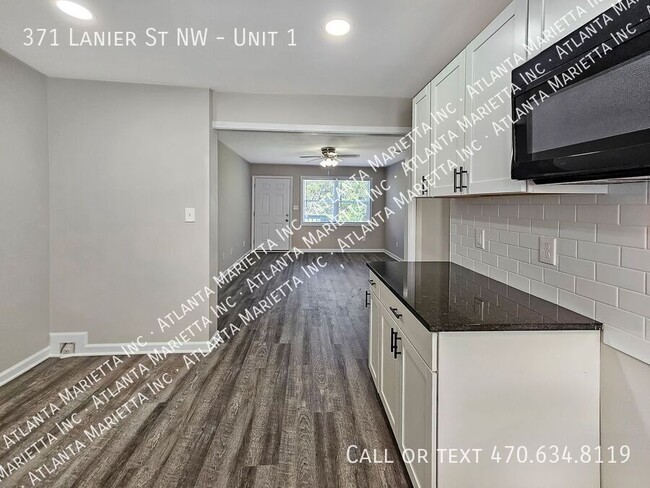 Building Photo - Beautifully Updated 2/1 on Main Level - Ho...