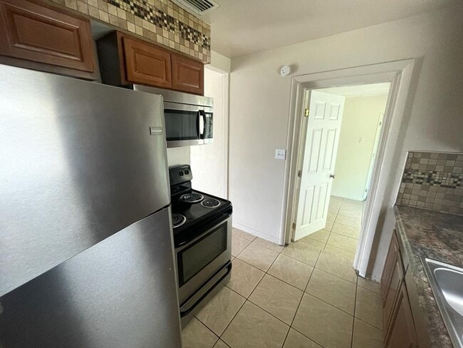 Building Photo - Charming Haven: Uncover Your Dream Home at...
