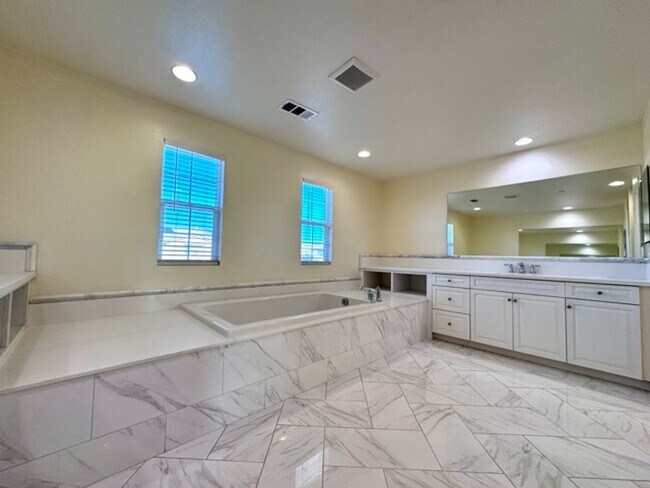 Building Photo - Welcome to this stunning 5 bedroom home fo...