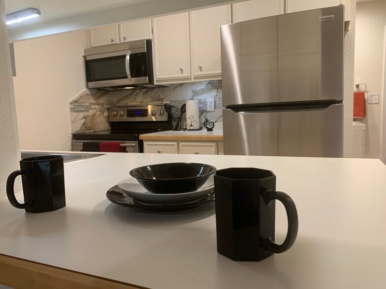KITCHEN- SS appliances, fresh tiling, under counter lighting - 2227 Canyon Blvd