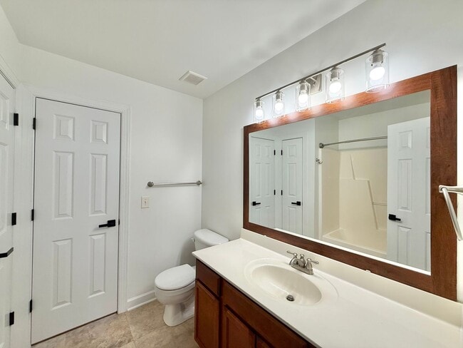 Building Photo - Modern 3BD, 2.5BA End Unit Raleigh Townhome with HOA Amenities Near I-540 & Triangle Town Center