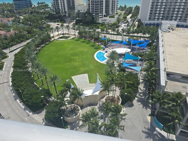 Building Photo - 19370 Collins Ave