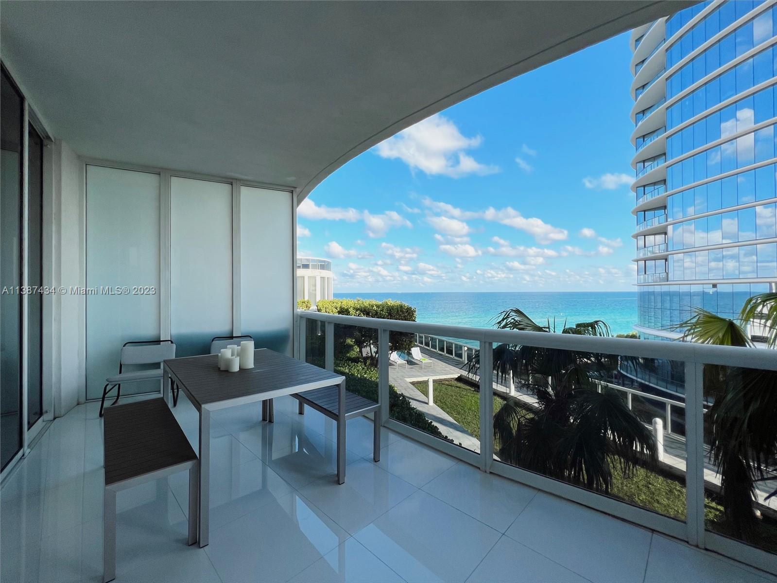 Building Photo - 15811 Collins Ave