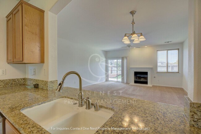 Building Photo - Charming single-story home nestled in the serene Edgewater Community