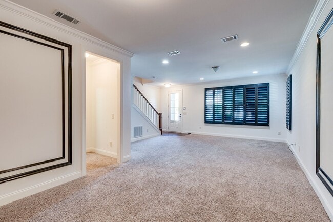 Building Photo - Welcome to this charming end unit townhome