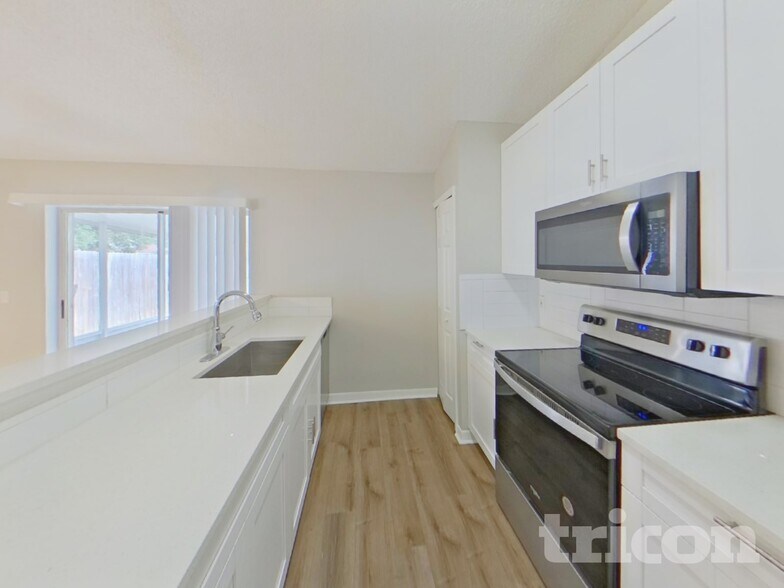 Building Photo - 6208 Cannoli Pl