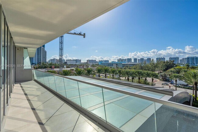 Building Photo - 18501 Collins Ave