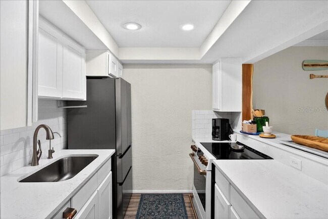 Building Photo - 1 N Ocean Palm Villas