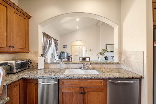 Kitchen opens to living room - 108 S El Molino Ave