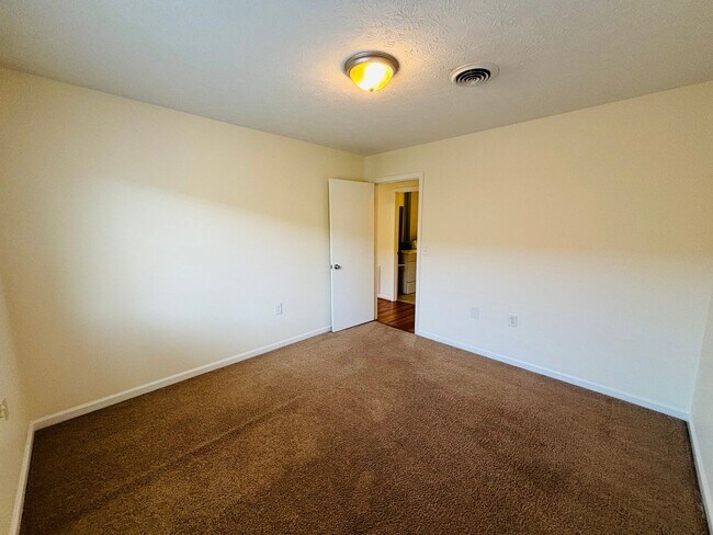 Building Photo - * RE-RENTAL AVAILABLE 8/14/26 * 4 Bedroom, 2 Bath Apartment