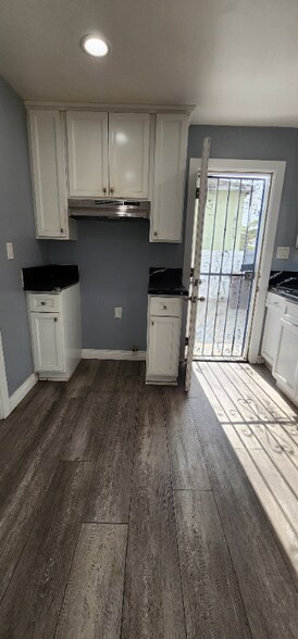 Building Photo - 10408 Anzac Ave