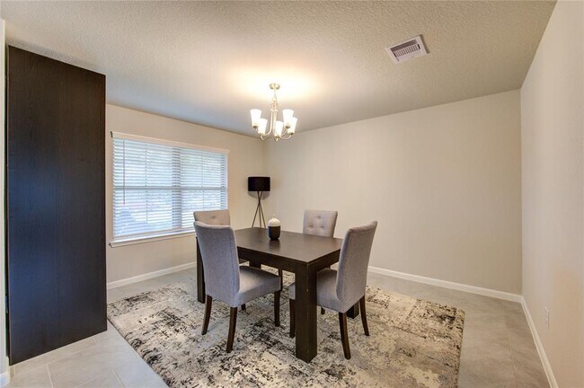 Building Photo - 9623 Japonica Dr