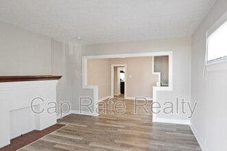 Building Photo - 1111 E 22nd Ave