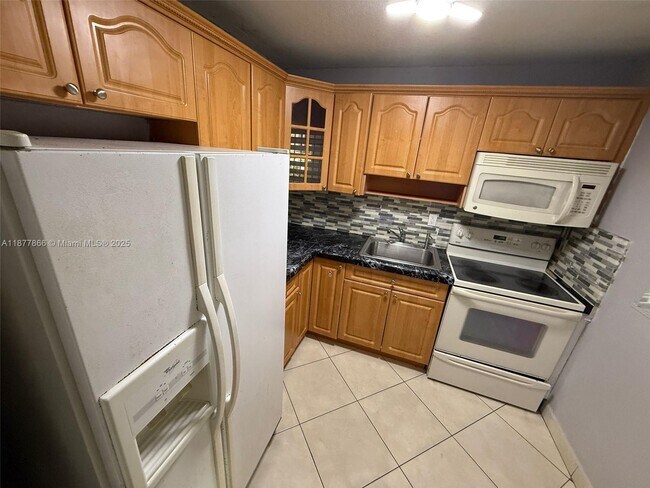 Building Photo - 1325 W 68th St