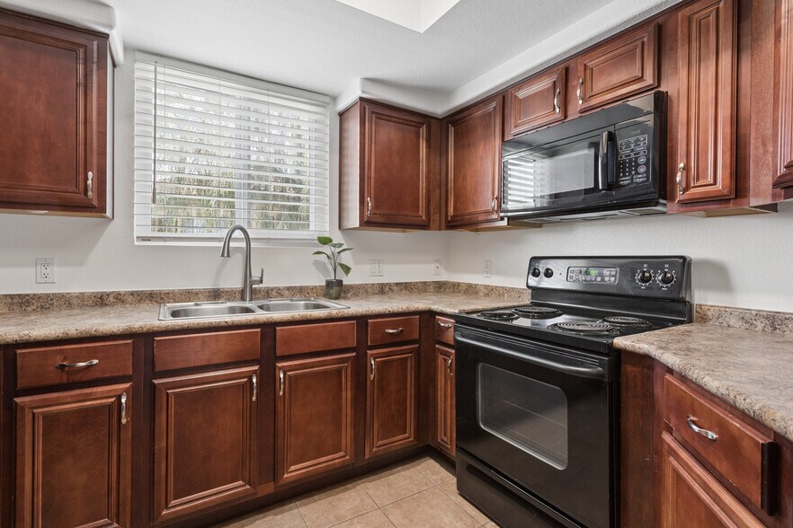 Kitchen - new faucet and disposal - 4925 E Desert Cove Ave