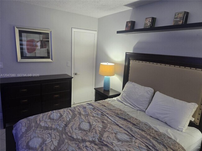Building Photo - 4265 NW S Tamiami Canal Dr