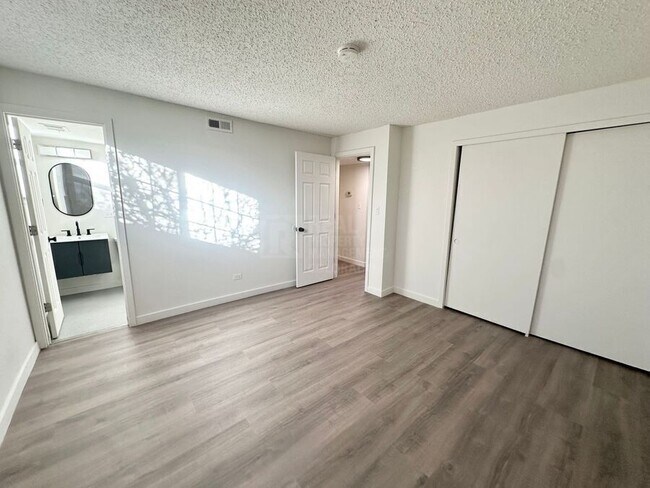 Building Photo - 9110 E Girard Ave