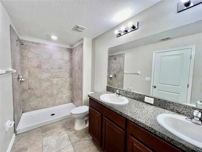 Building Photo - 7639 Ginger Lily Ct