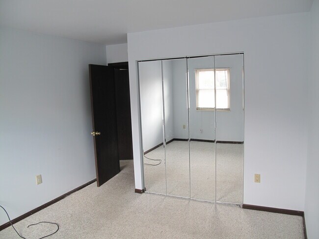 2nd bedroom before new floor and paint - 214 Brian Dr