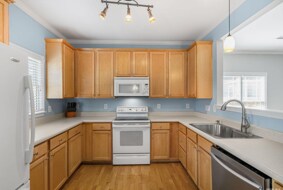 First floor- Kitchen with dish-, cookware provided - 1207 Bungalow Park Dr