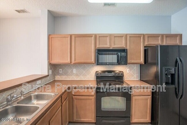 Building Photo - 6092 Bartram Village Dr