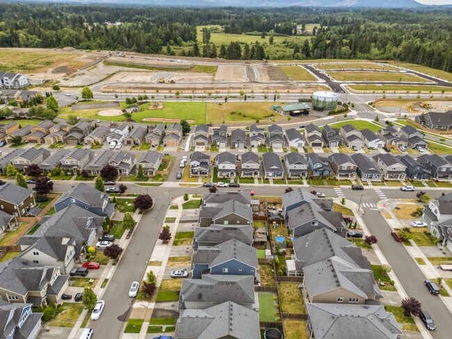 Building Photo - Spacious 4-Bedroom Home with Quartz Counters, Fully Fenced Yard & 2-Car Garage in Yelm!