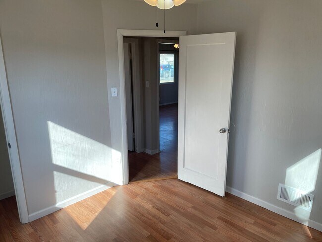 Building Photo - Adorable 2 Bedroom, 1 Bathroom Home with Huge Fully fenced Yard and detached garage, Move-In Ready!