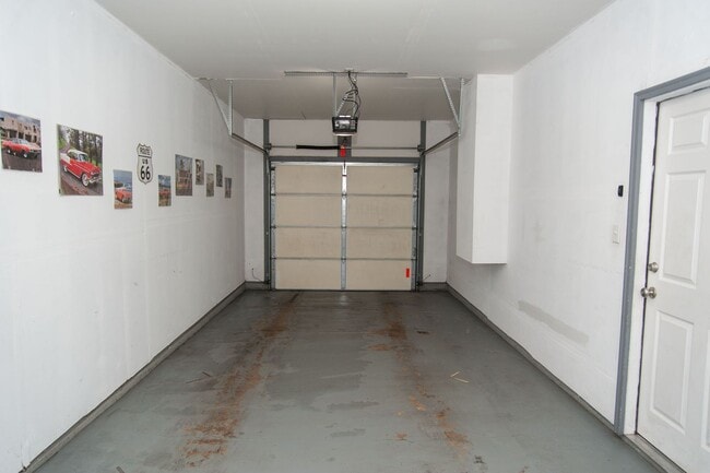 Building Photo - Updated and Bright 2B/2B with Attached Garage Now Available!