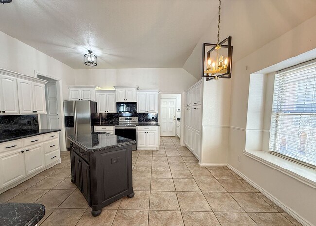 Building Photo - Gated in West Edmond! Storm Shelter! Tons of Space!