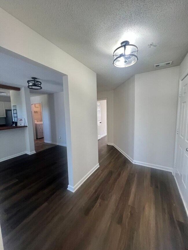 Building Photo - RENT SPECIAL! Freshly Painted! New Luxury ...