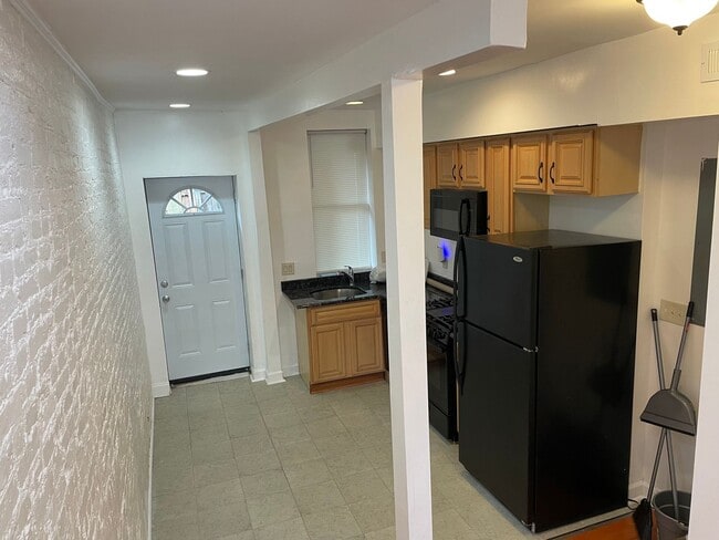 Building Photo - Charming 2-Bedroom, 1.5-Bathroom Brick Townhouse in Pigtown