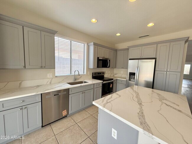 Building Photo - 6558 W Townley Ave