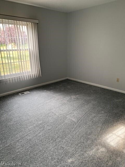 Building Photo - 6995 Carriage Hill Dr