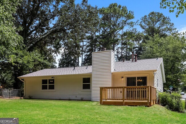 Building Photo - 9073 Woodgreen Way